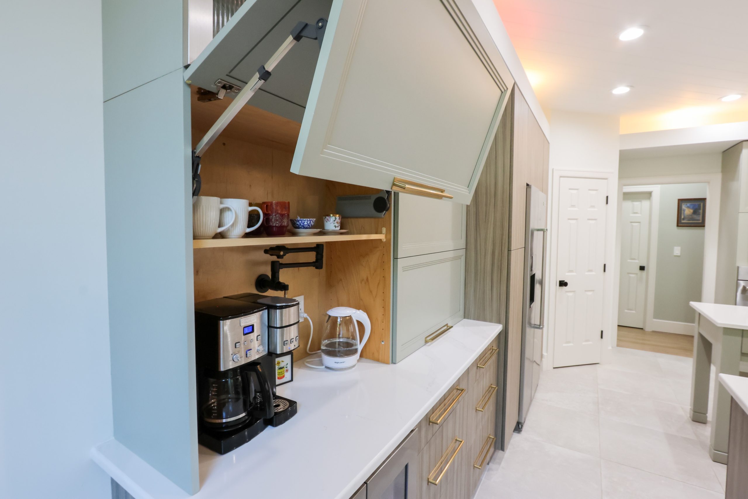 modern kitchen with hide away for kitchen and bar